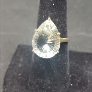 Pear shaped, solitaire aquamarine ring. 10k gold